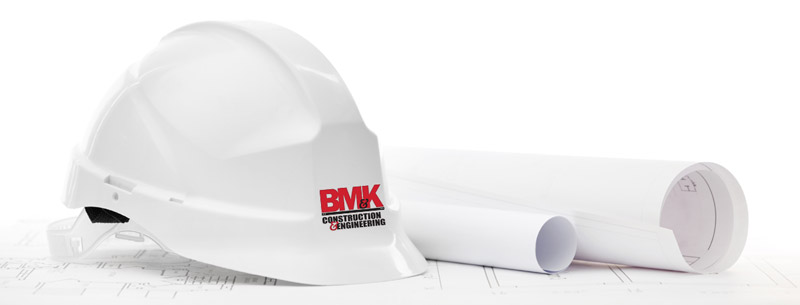 Hardhat with BM and K logo and engineering drawings